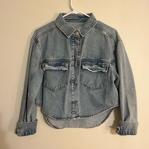 Stylish Blue Denim Jacket with Frayed Details